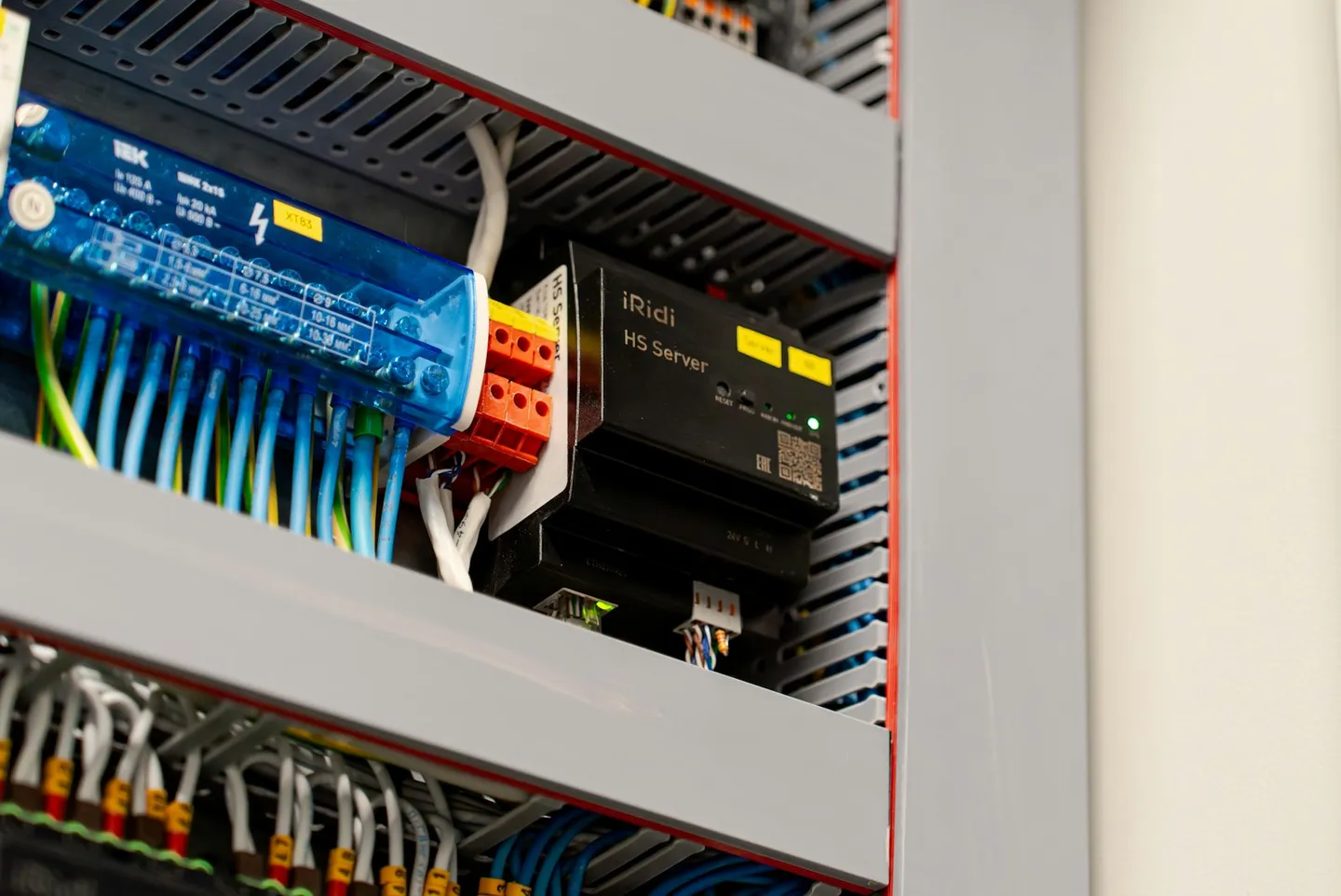 Open electrical and automation control panel with wiring and modules, the kind of enclosure where BACnet points are commissioned